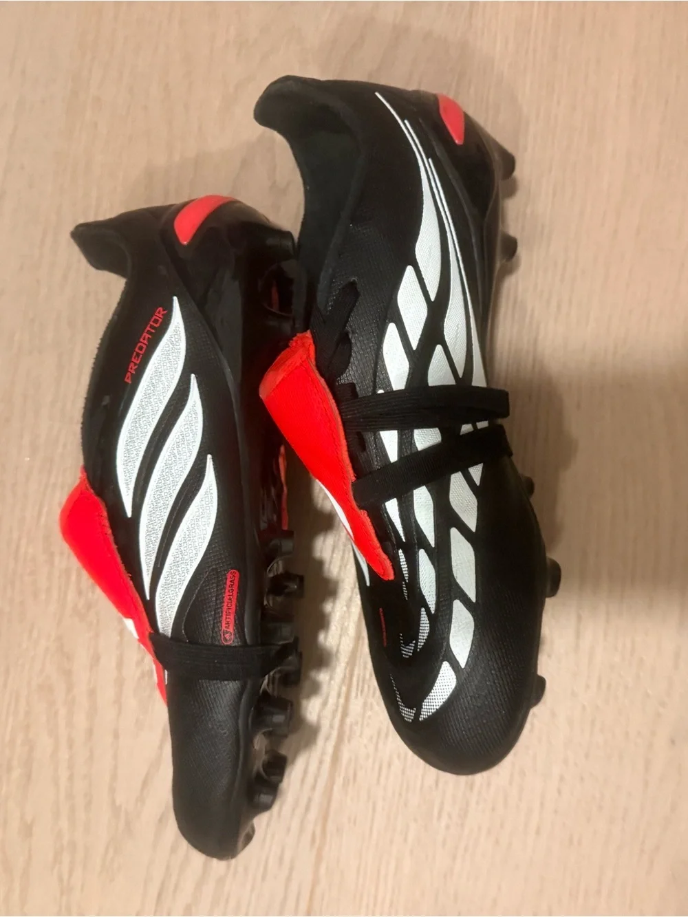 adidas Predator kids Soccer cleats in Black, Red & White